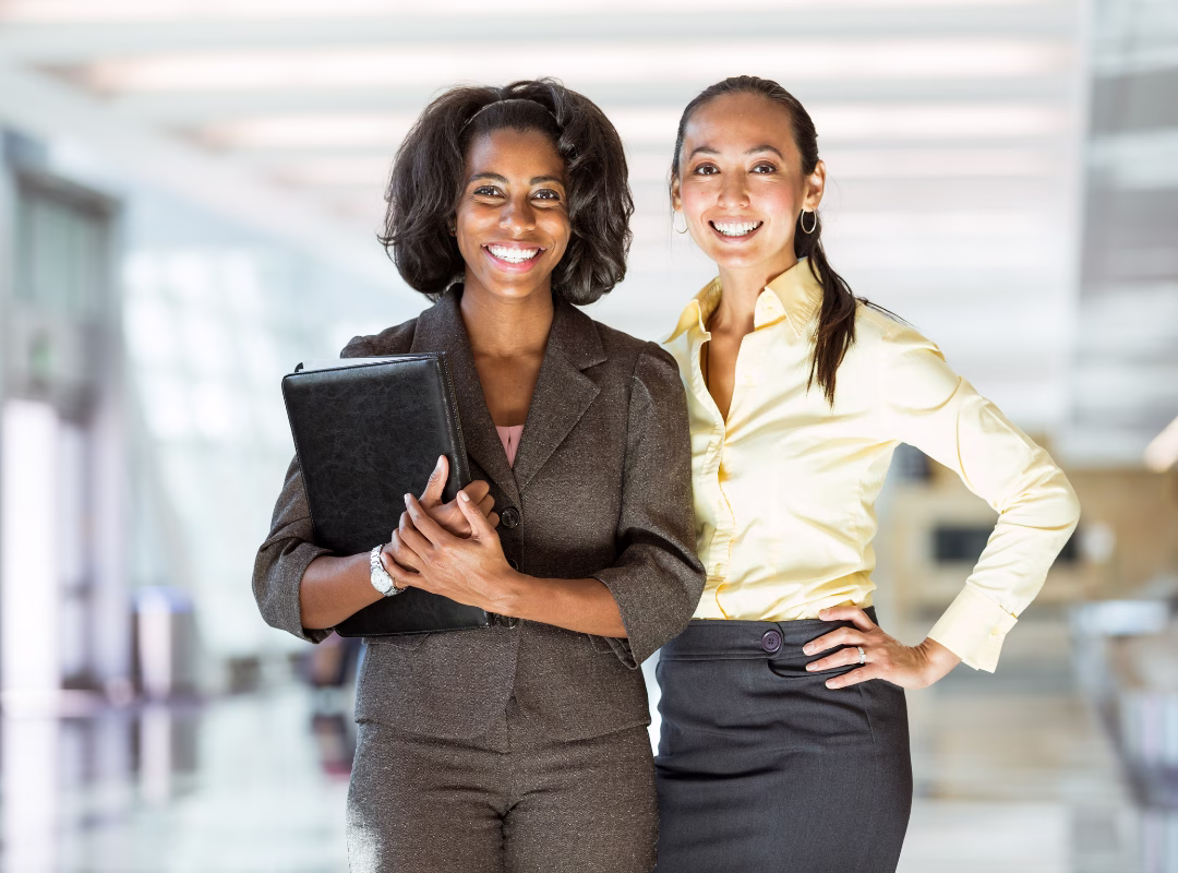 Two women smiling